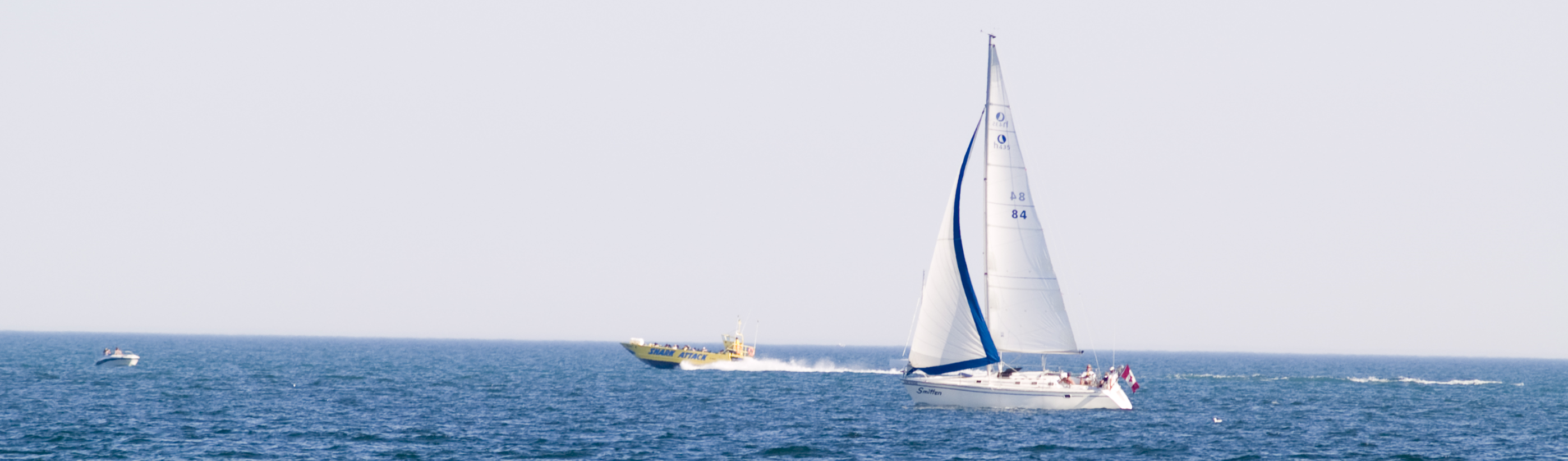 Sail and power boats