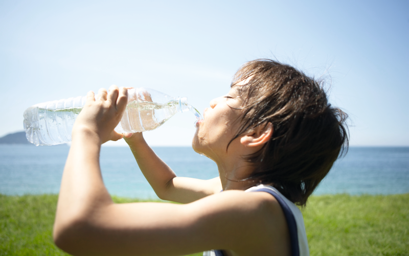 Boy drinking cold water